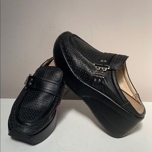 Women’s Black Perforated Leather Wedge Clogs